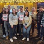 Group photo in a banquet hall