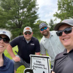 Group of people playing golf