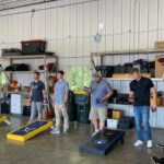 People playing cornhole