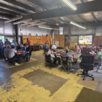 People hanging out in a garage
